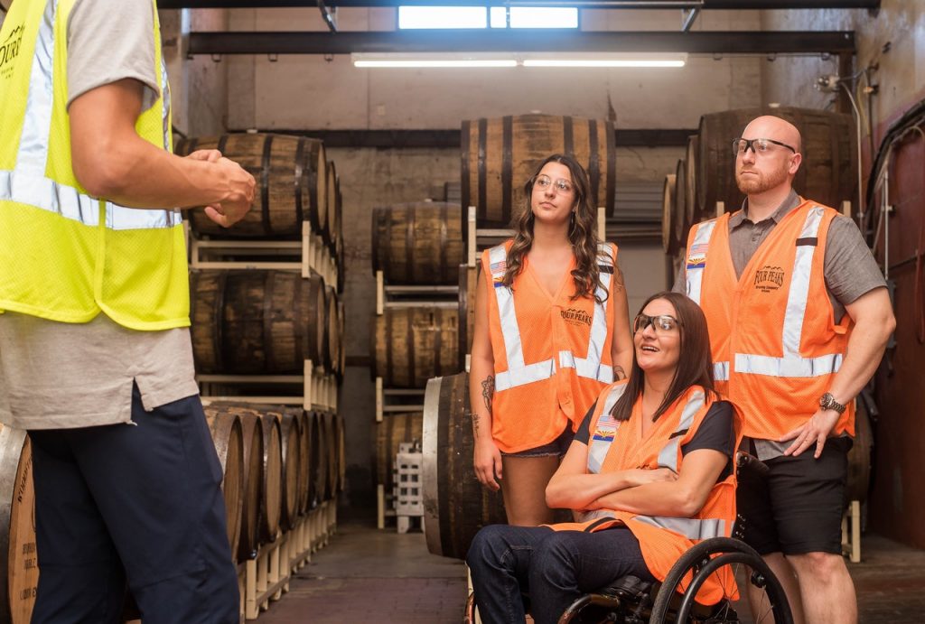 supervisor and workers in safety vests
