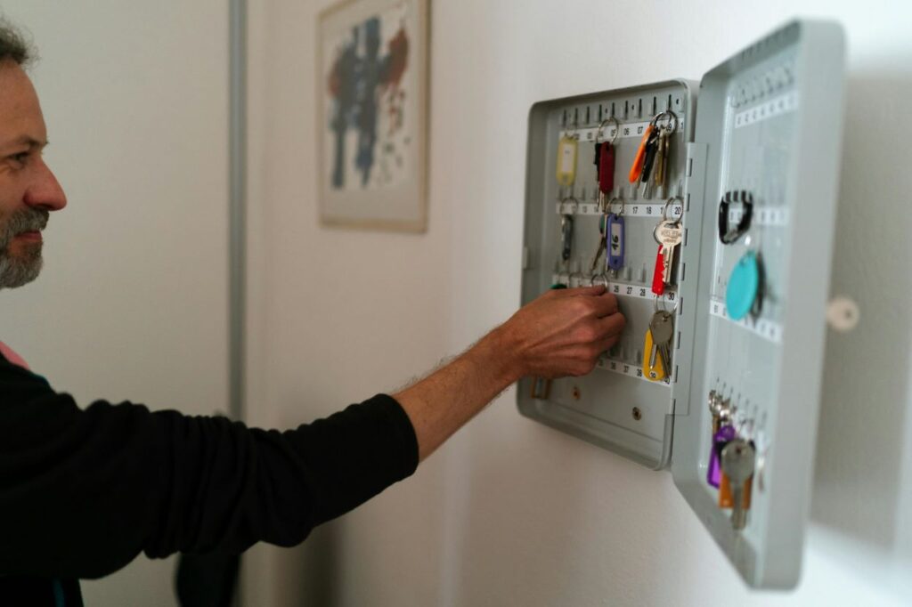 physical security; employee looking in key box