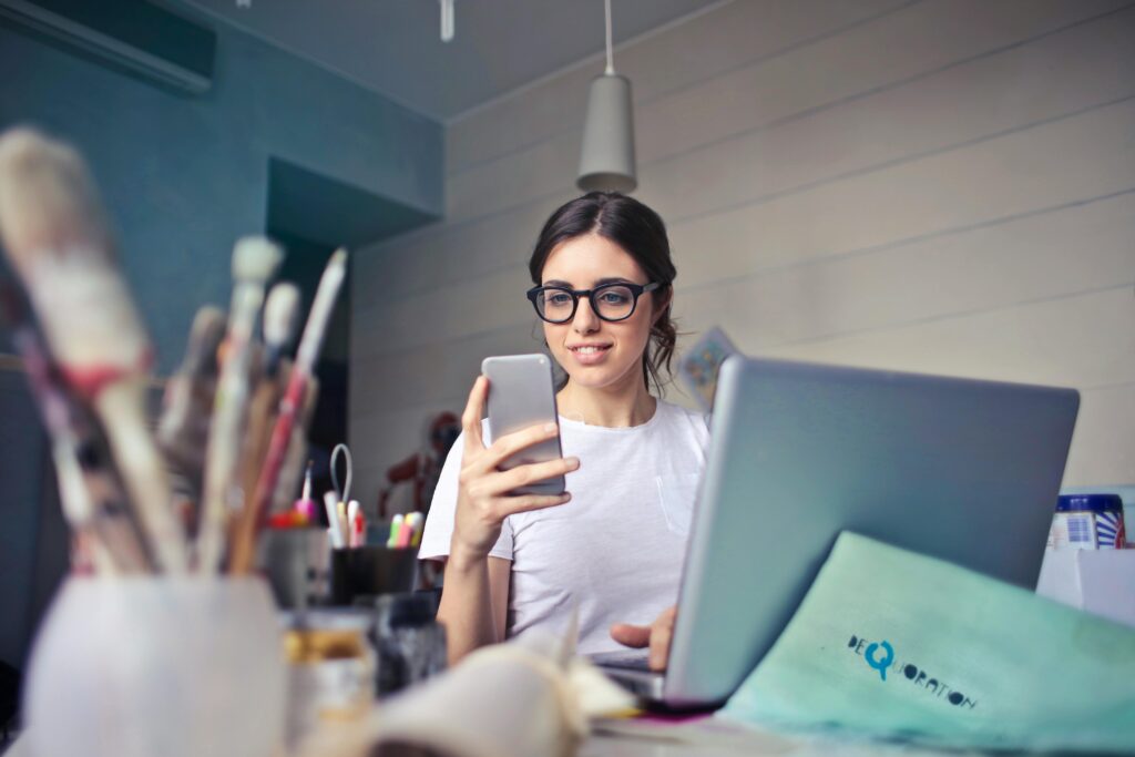 small business owner looking at phone