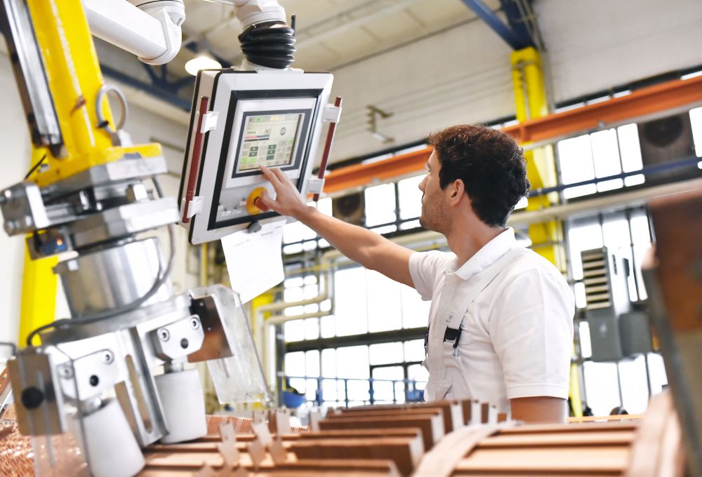 production employee using machinery